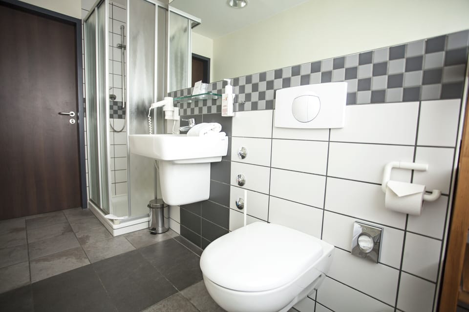 Shower, free toiletries, hair dryer, bathrobes