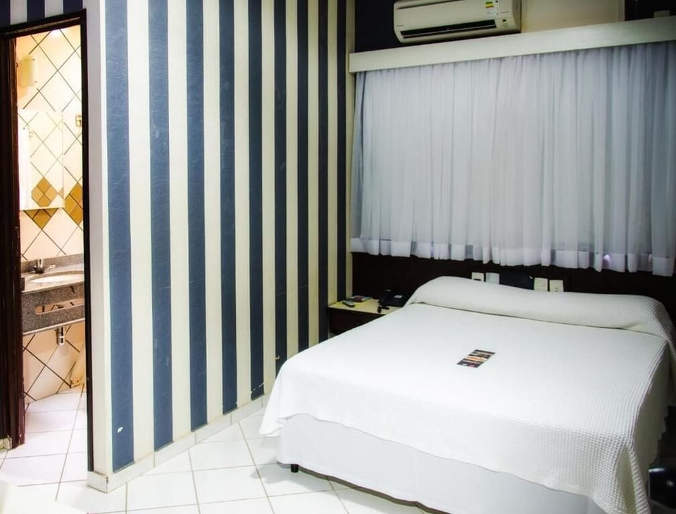 Deluxe Single Room | Minibar, in-room safe, individually furnished, desk