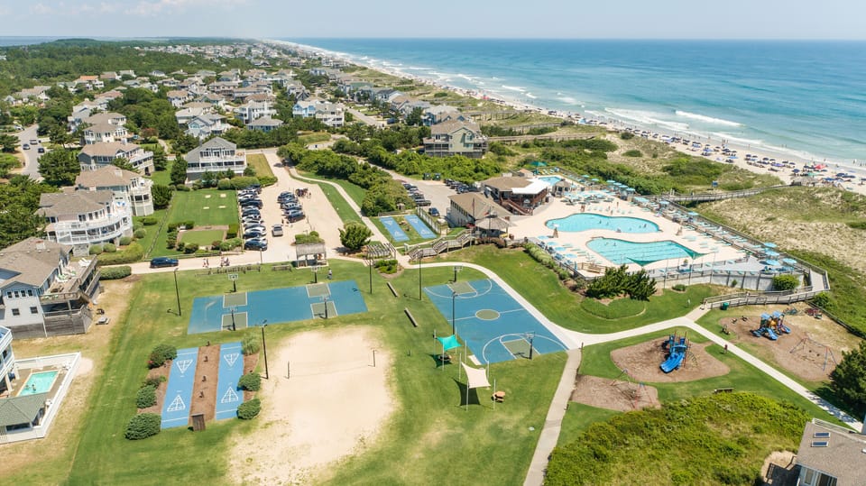 Oceanfront complex with pools, basketball courts, beach access
