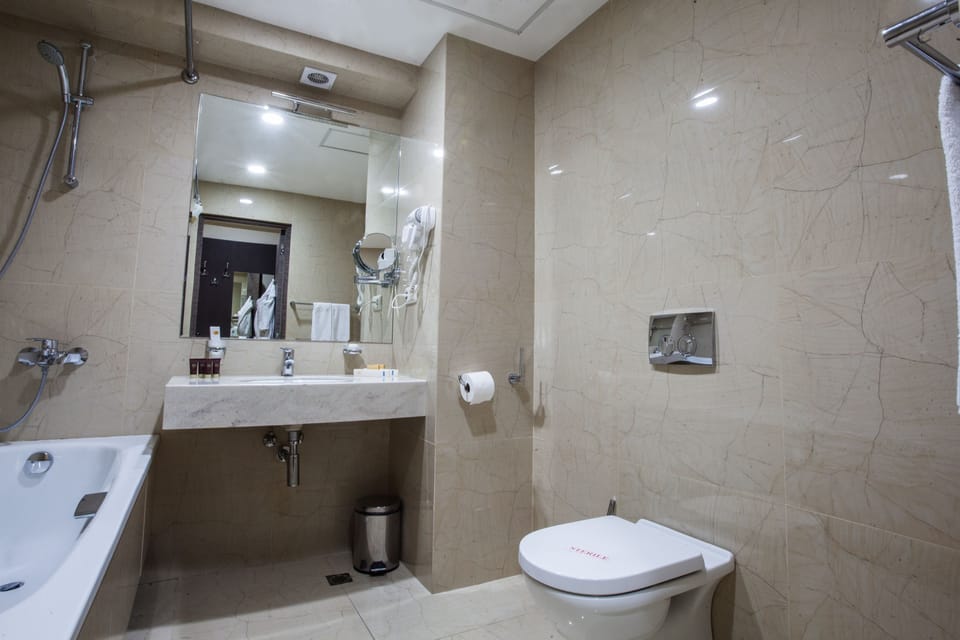 Bathtub, free toiletries, hair dryer, slippers