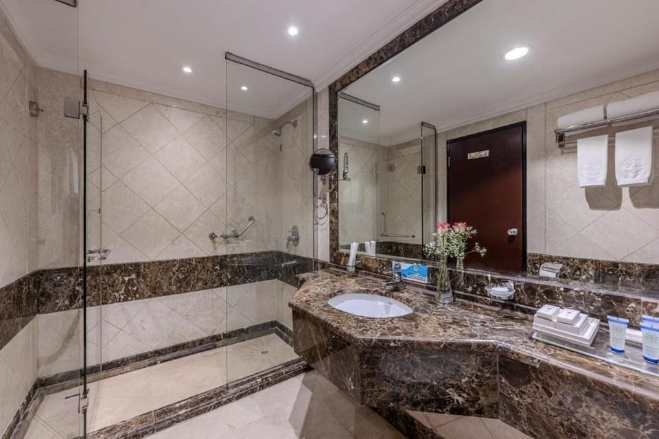 Hair dryer, bathrobes, slippers, towels