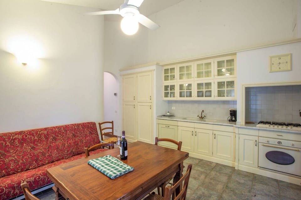 Apartment, 2 Bedrooms | Living area | 90-cm flat-screen TV with cable channels, TV, table tennis