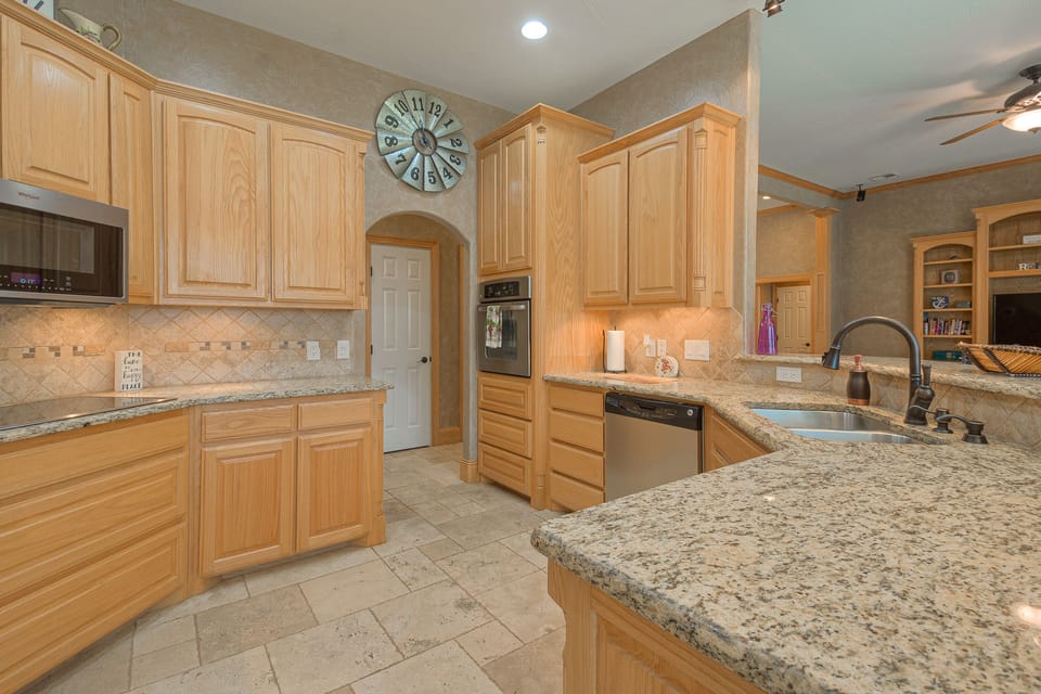 Gorgeous kitchen.  Induction stove top. 