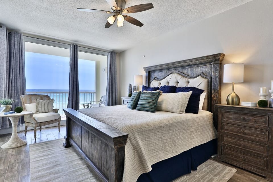 Gulf front master bedroom with a king size bed.