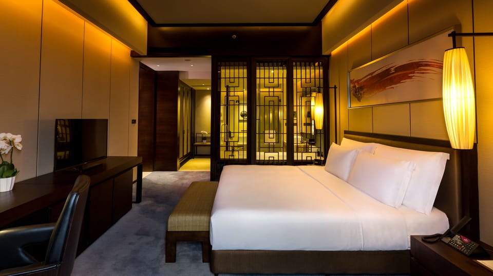 1 Bedroom Suite Dining | Minibar, in-room safe, desk, laptop workspace