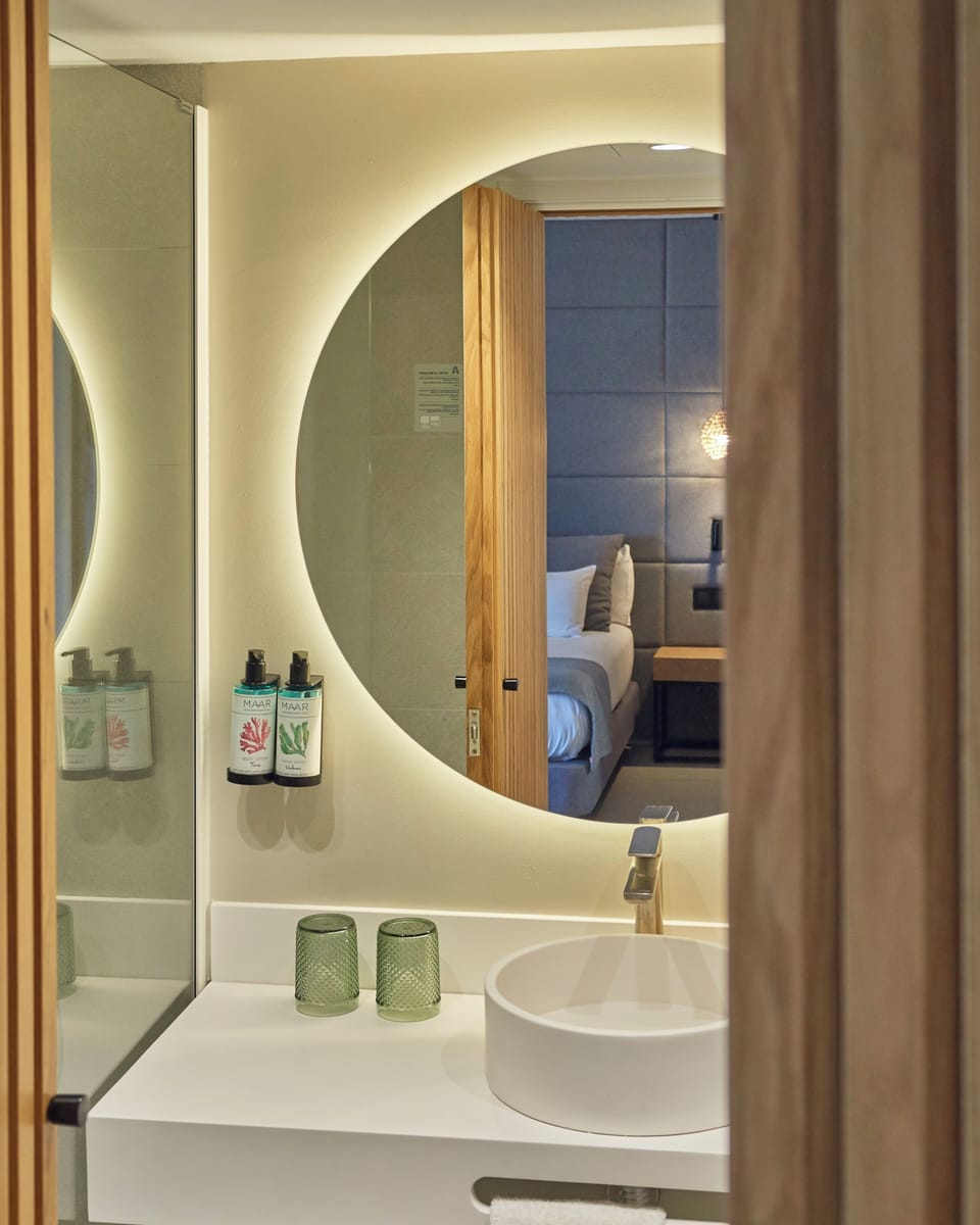 Shower, free toiletries, hair dryer, slippers