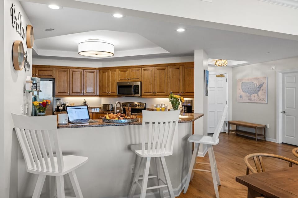 Kitchen - The breakfast bar seats three guests and the perfect spot for a quick bite.