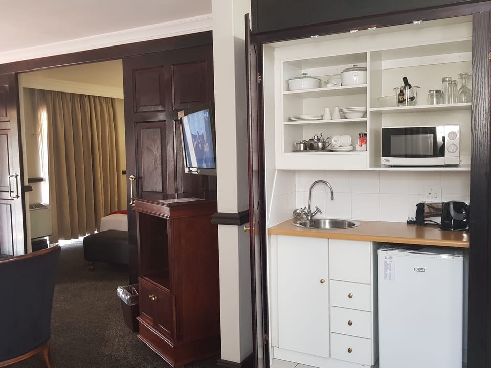 Fridge, microwave, toaster, cookware/dishes/utensils