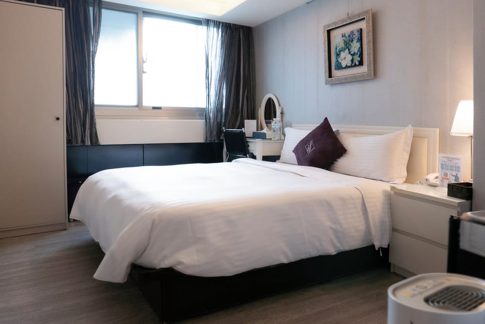 Deluxe Double Room | Down comforters, pillowtop beds, individually decorated, desk