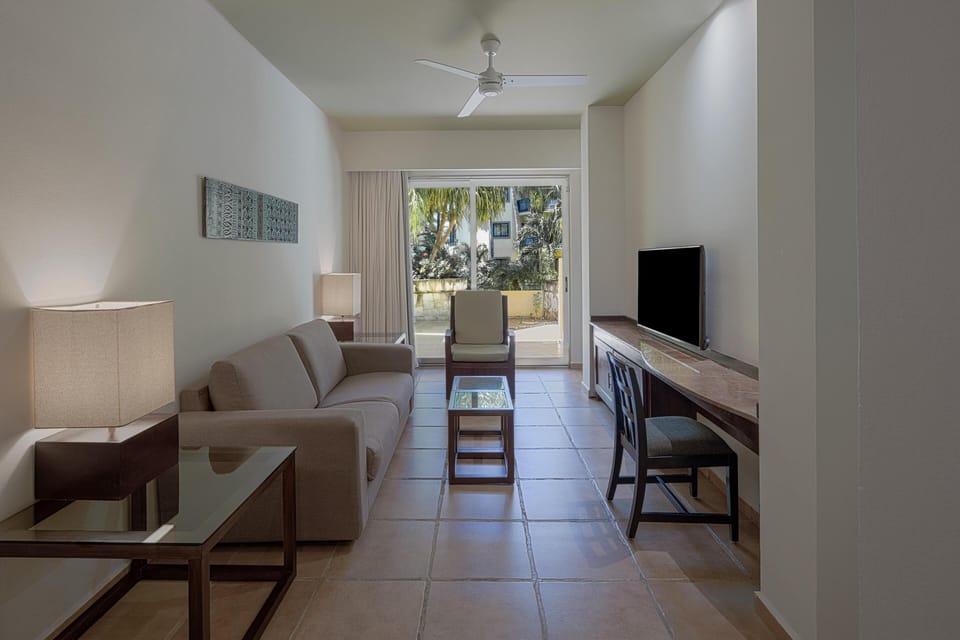 Privileged Family Suite | Living area | Plasma TV