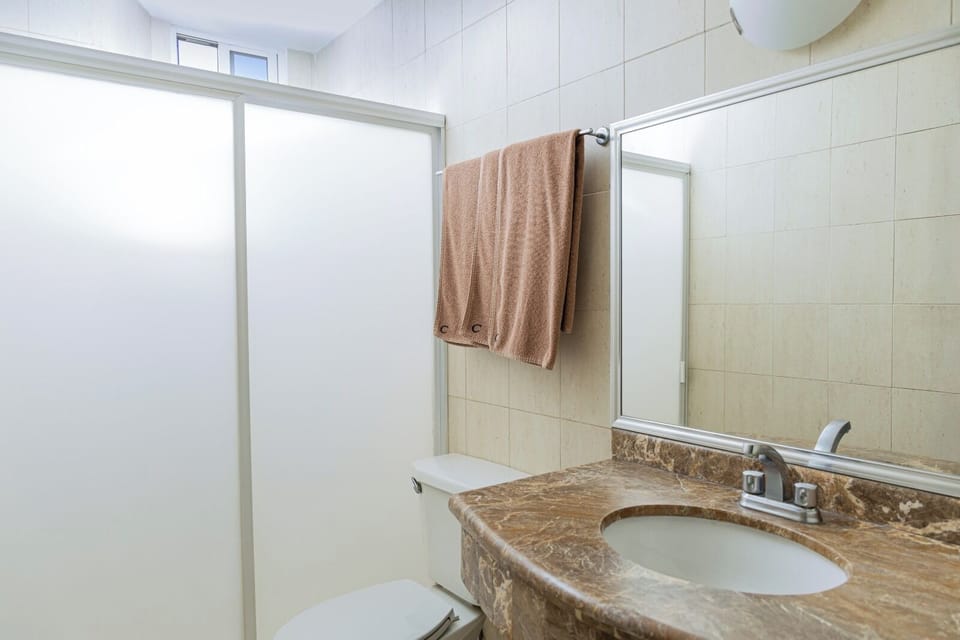Shower, rainfall showerhead, towels, soap