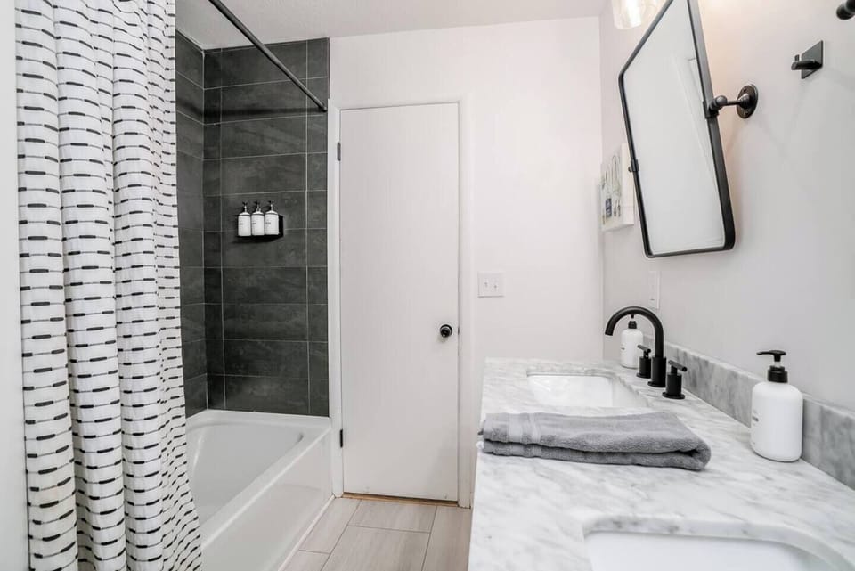 Full bath with tiled shower