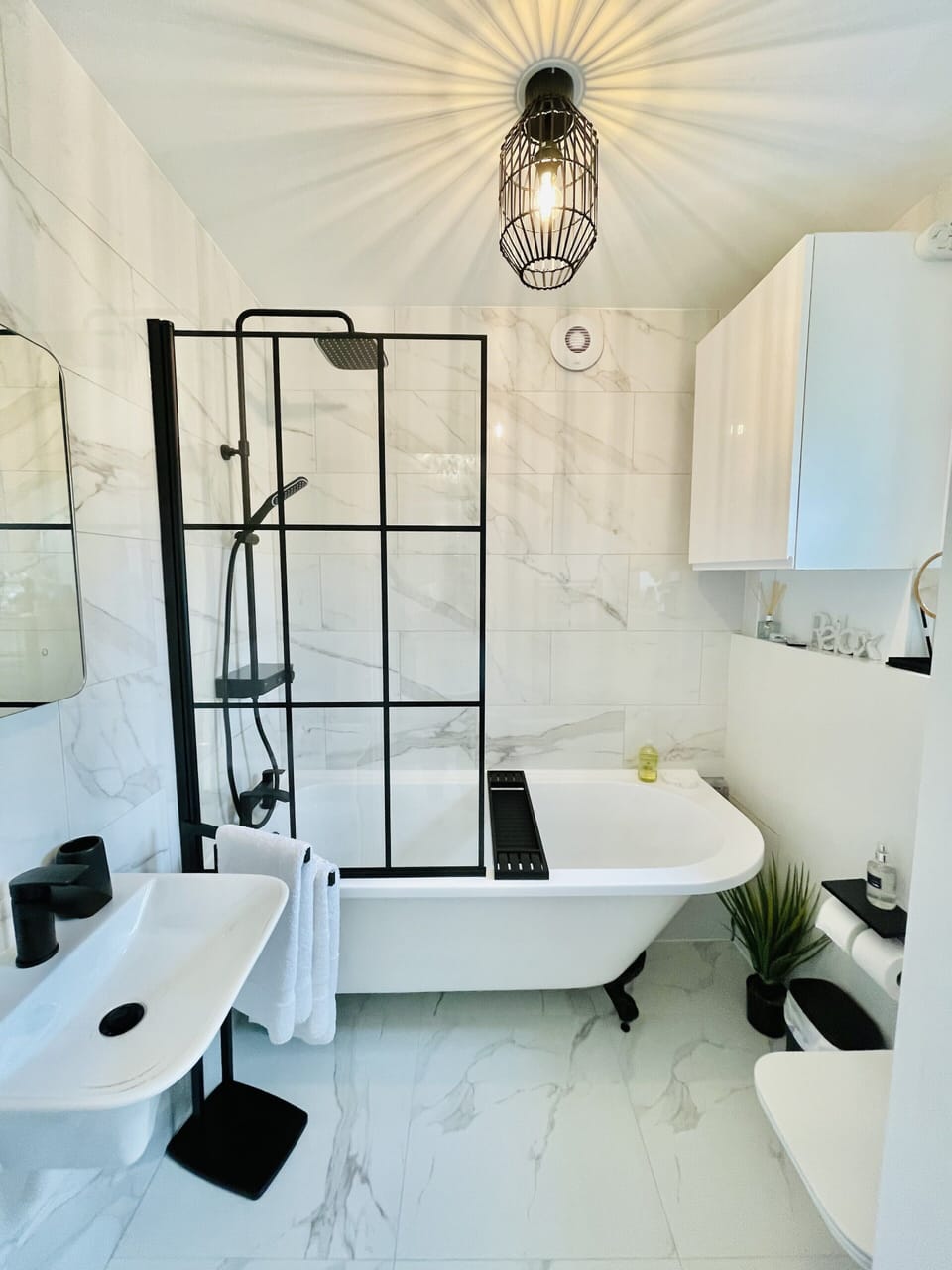 Fantastic Marble Bathroom with Claw Foot Roll Top Bath to enjoy a fabulous soak