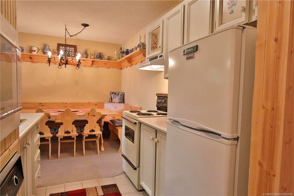 Kitchen - Fridge, stove, oven