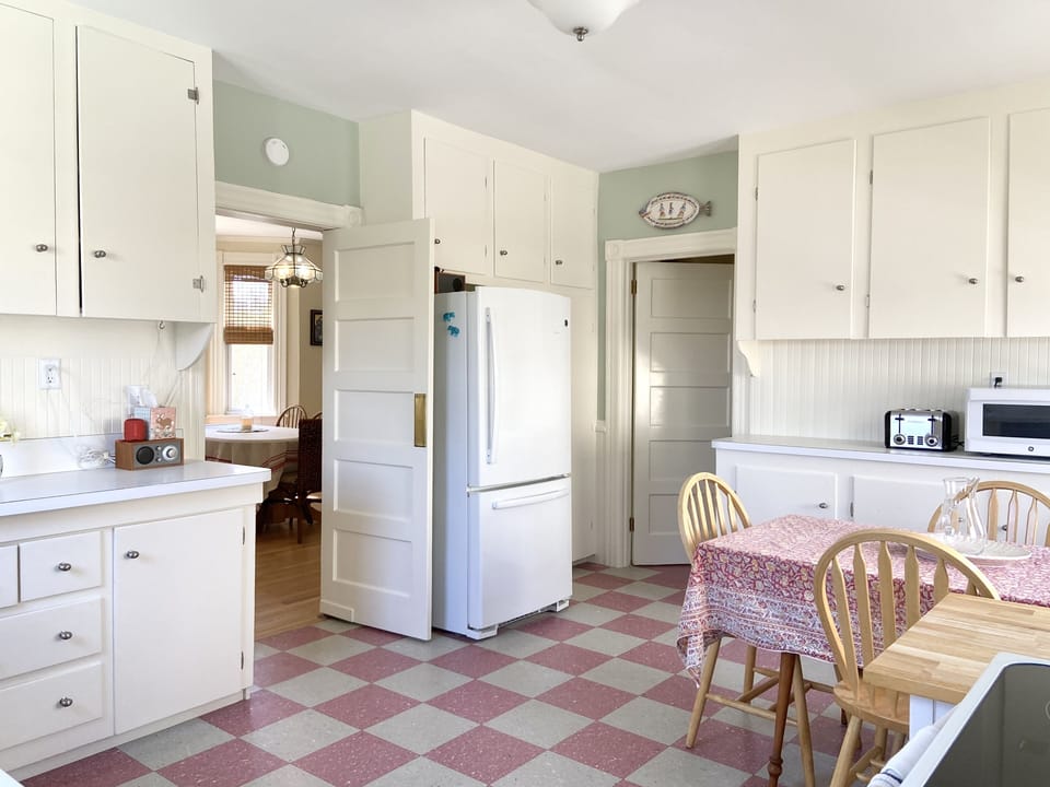 Kitchen facing Dining room and back stairs