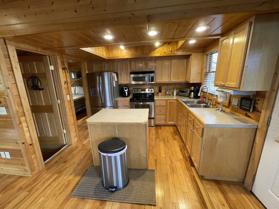 Full kitchen, electric stove, coffee maker, air fryer, dishes, etc. like home