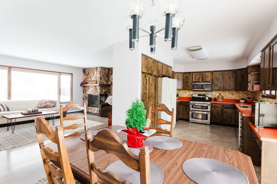 Dining room with views of the living room and full view of the kitchen.