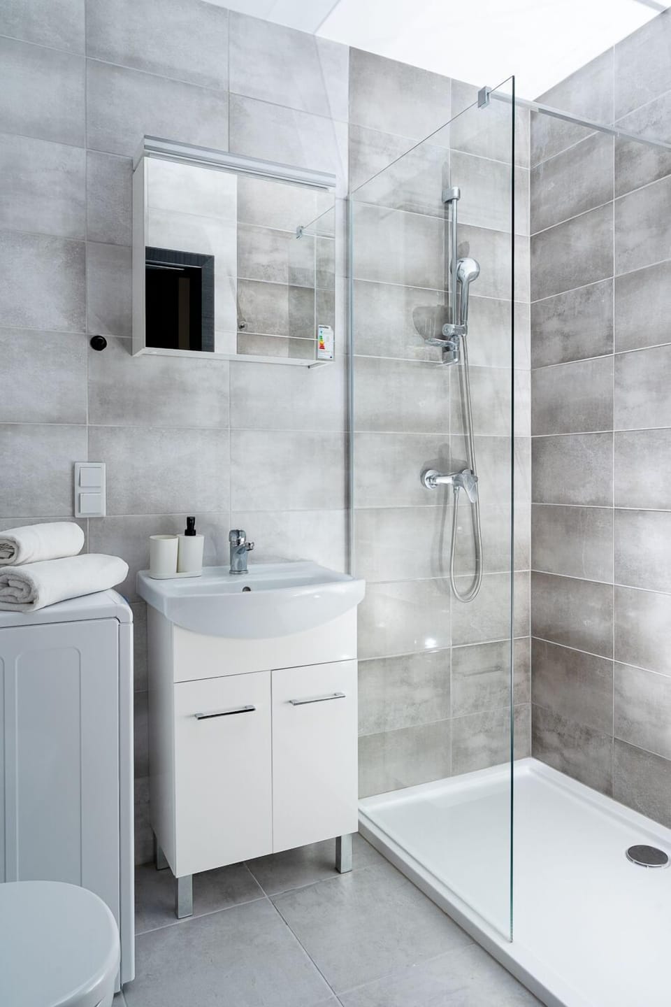 Design Studio | Bathroom | Shower, rainfall showerhead, hair dryer, soap