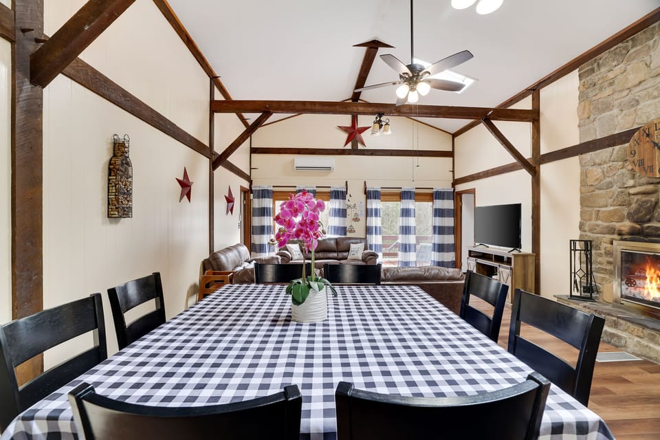 Dining area with a table for 8 and a high chair