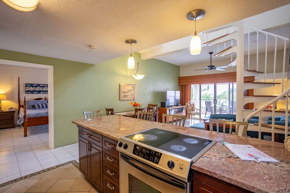 Full kitchen with all your supples and paper goods. Open Living Room and Patio.