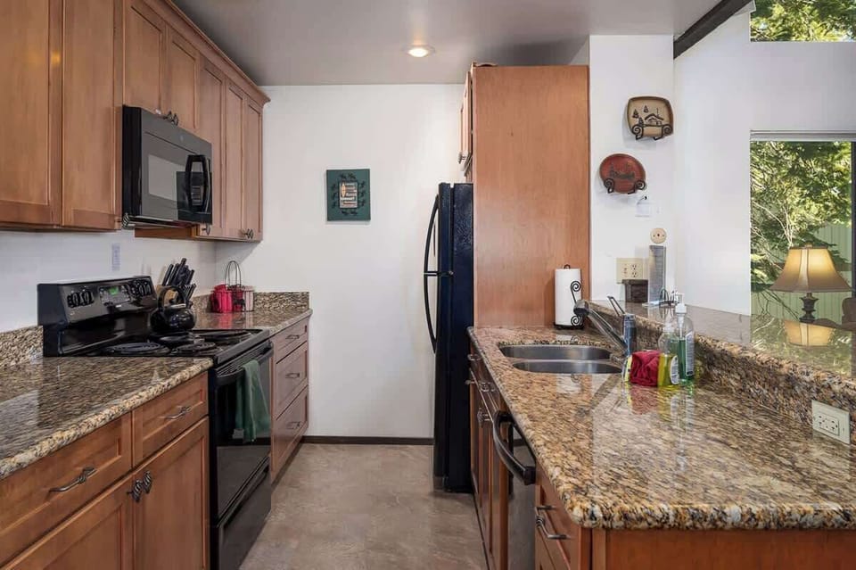 Fully Stocked Kitchen with Granite Countertops
