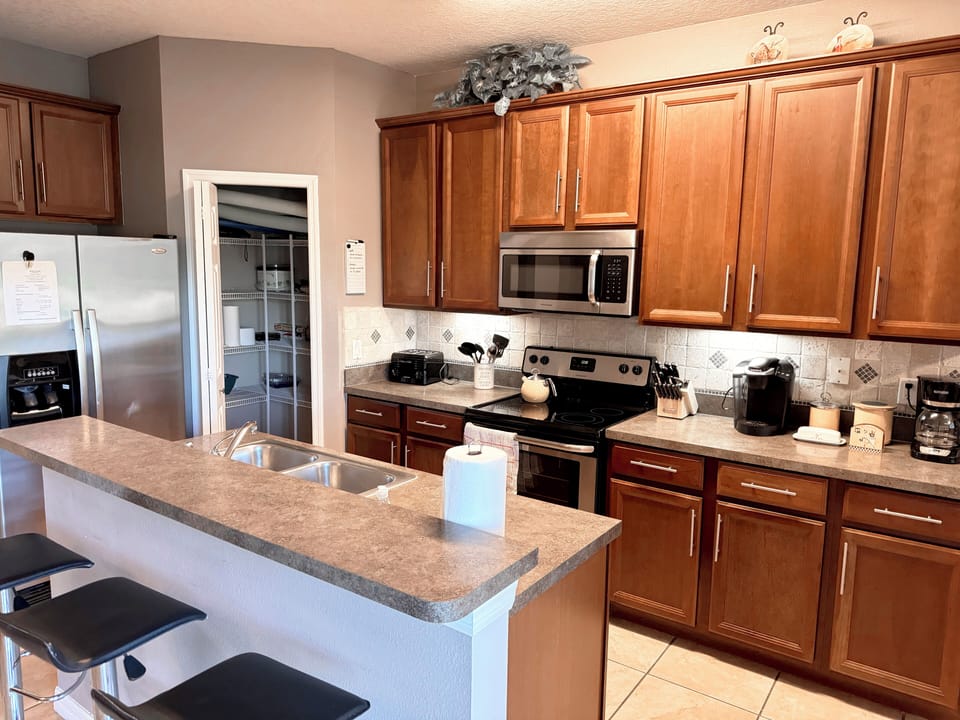 Open kitchen with breakfast counter