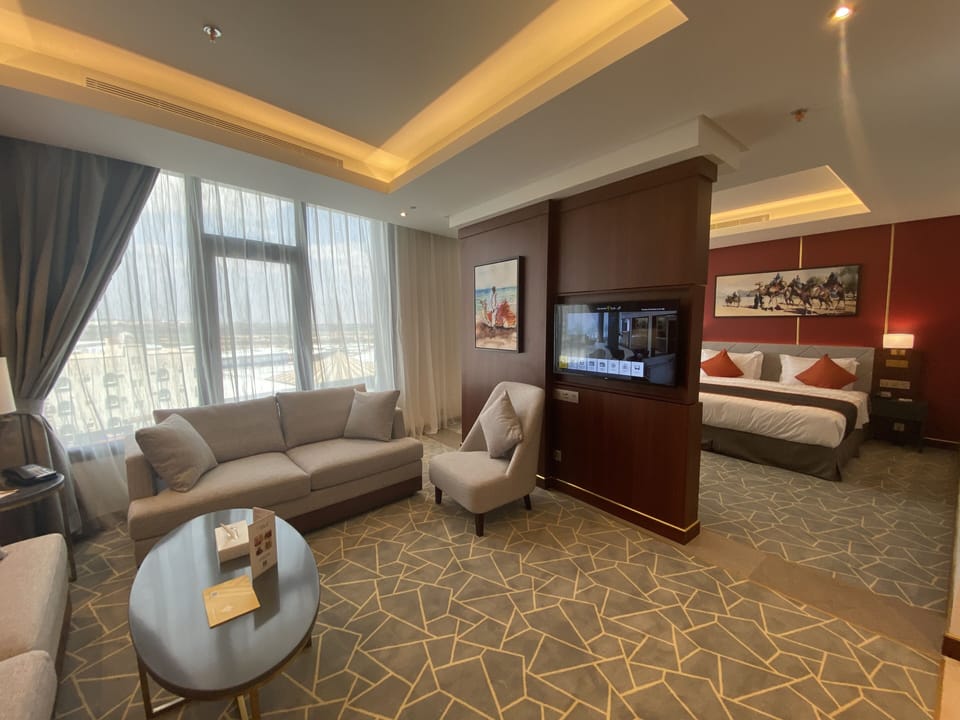Junior Suite | Living area | 43-inch LED TV with satellite channels, TV