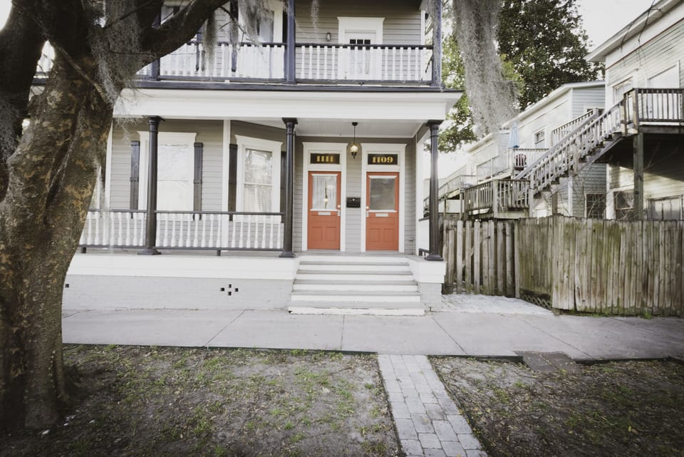The entrance to this retreat is up the steps and through the door on the right.