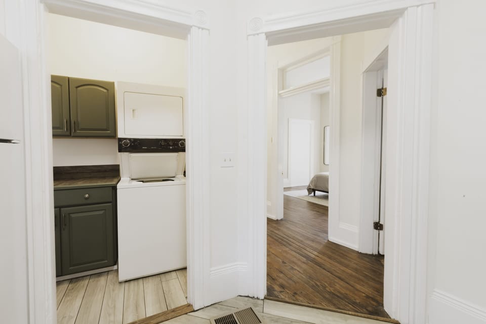 The laundry room is conveniently located off the kitchen.
