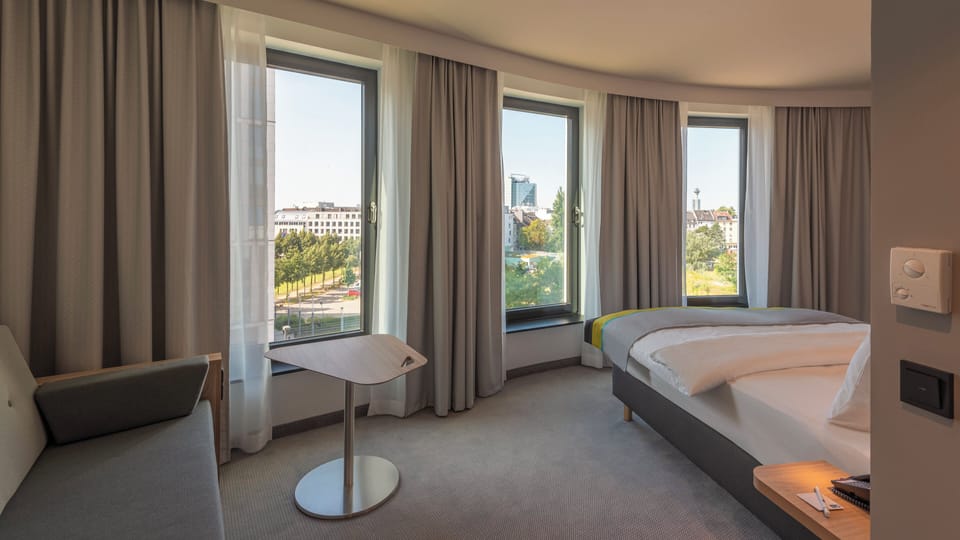 Standard Room, 1 Queen Bed with Sofa bed | In-room safe, desk, blackout drapes, soundproofing
