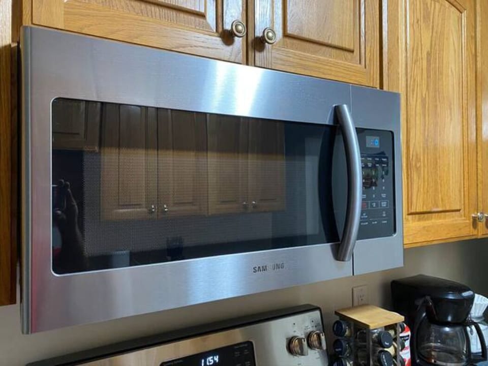 New stainless programmable microwave. Enjoy a movie and popcorn for a fun night!