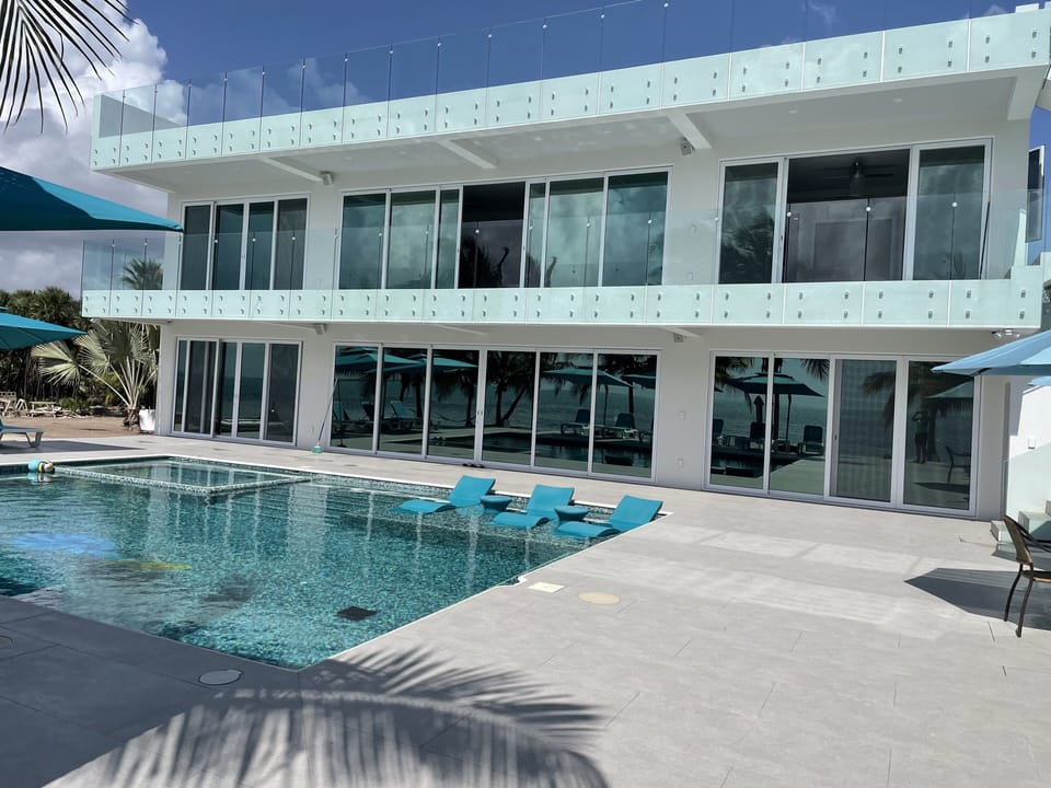 Villa features a poolside level, a  penthouse level & a rooftop level.