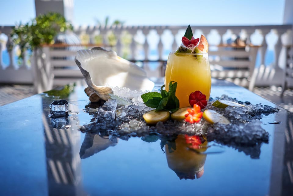 5 outdoor pools, open 10:00 AM to 5:00 PM, pool umbrellas, sun loungers