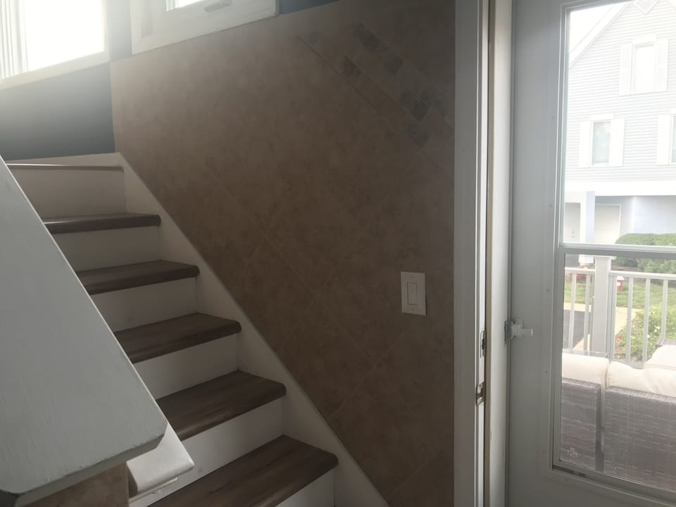 Steps up to 2nd level, main floor of house!  Landing are to go out on deck!