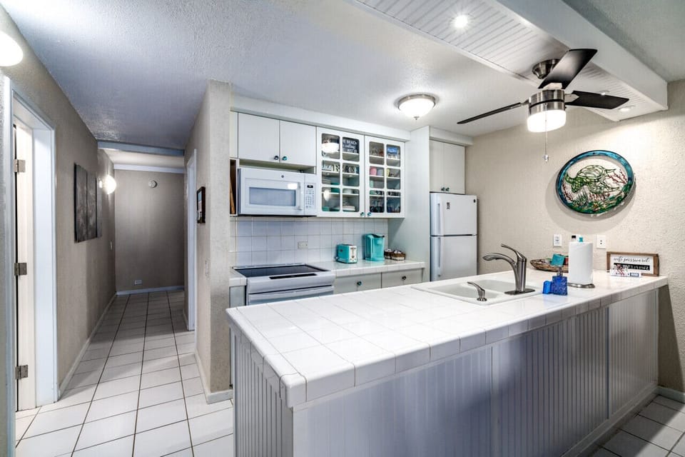 Spacious, well-appointed kitchen.