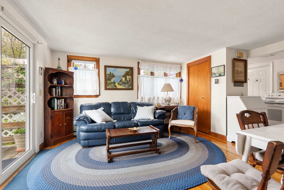 Living room with tv and comfortable seating.