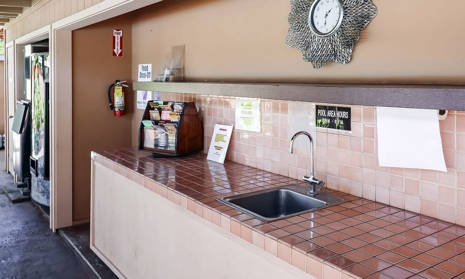 Kitchen area, ice and soft drink vending in pool cabana
