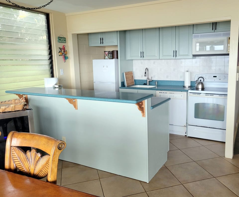 There is a beverage cooler as well as the refrigerator