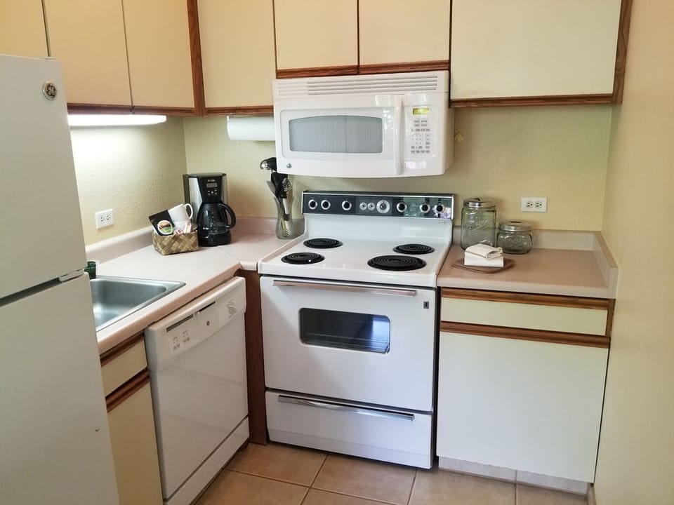 Full size fridge, range, microwave and dishwasher.