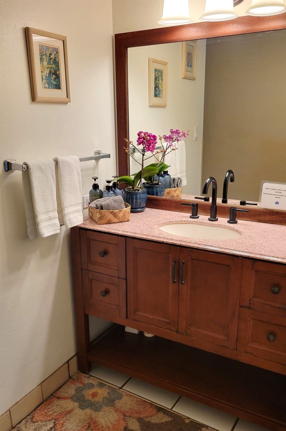 The bathroom has a separate vanity for conenience.