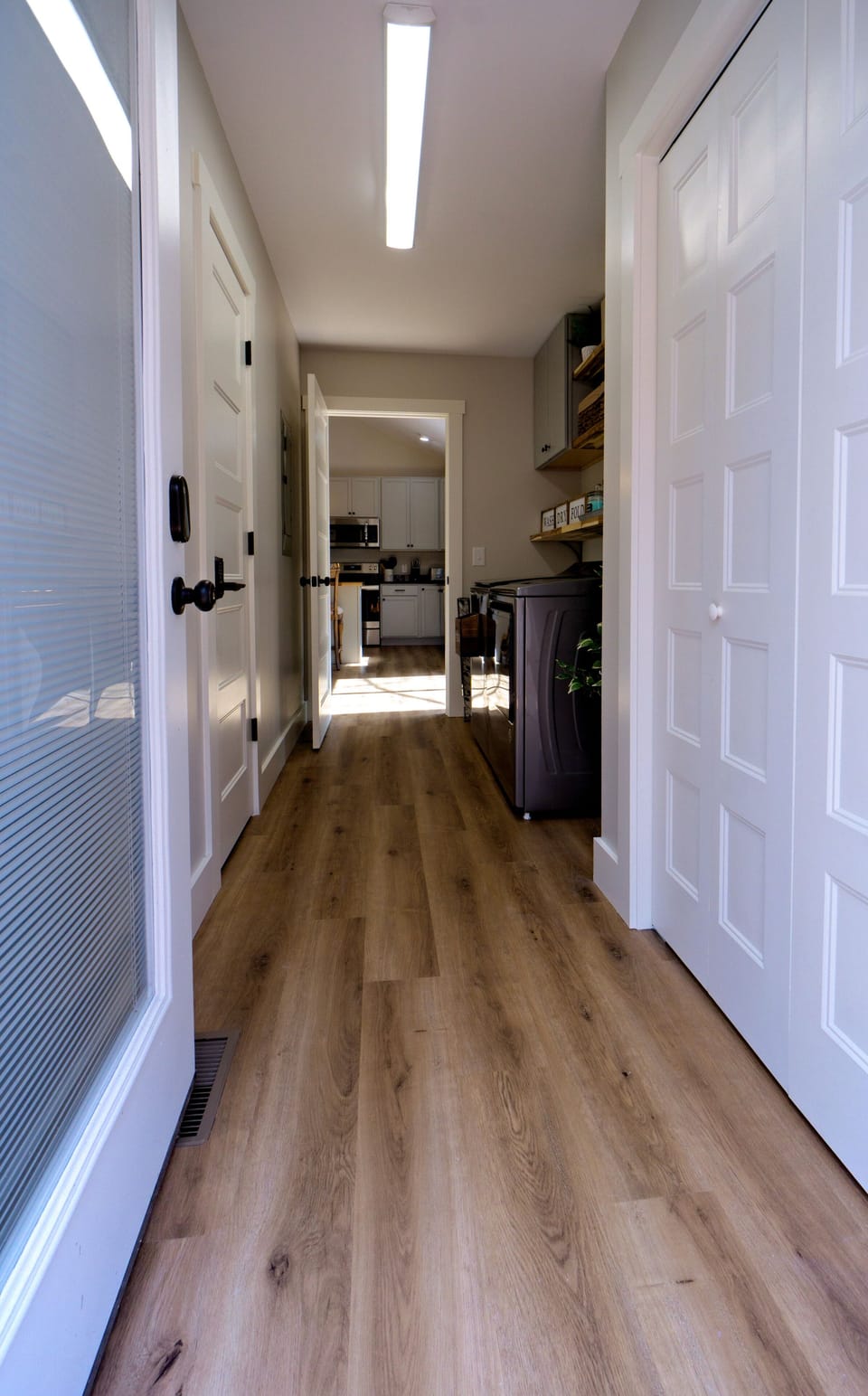 Side door; located off of laundry room.