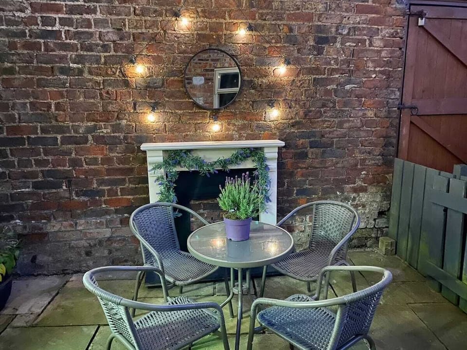 Outside courtyard with fetoon lights, perfect for an evening glass of wine