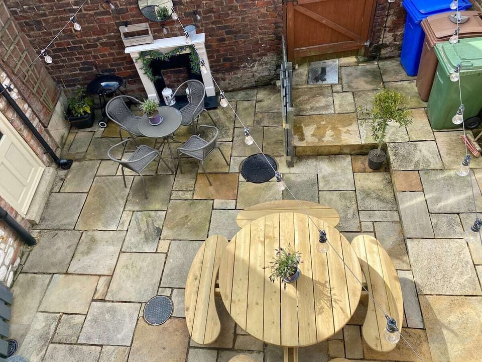 Outside courtyard with festoon lights, 2 x BBQ, seating for 12, not overlooked