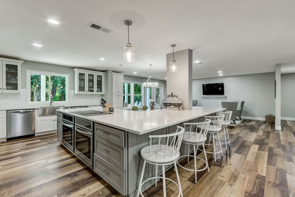 Spacious Kitchen with Huge Island, Beautiful Granite Countertops, Stainless Steel Appliances, Two Dishwashers, Double Oven, Double Refrigerator, Coffee Bar and Sitting Area