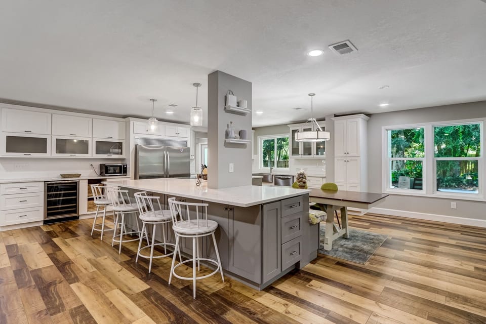 Kitchen with Huge Island, Beautiful Granite Countertops, Stainless Steel Appliances, Two Dishwashers, Double Oven, Double Refrigerator, Coffee Bar and Sitting Area