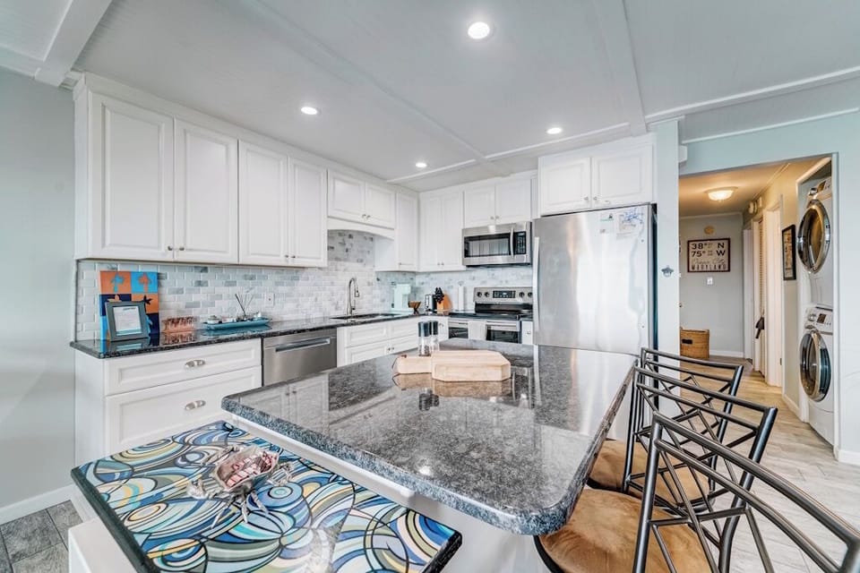 Fully stocked Kitchen with stainless steel appliances