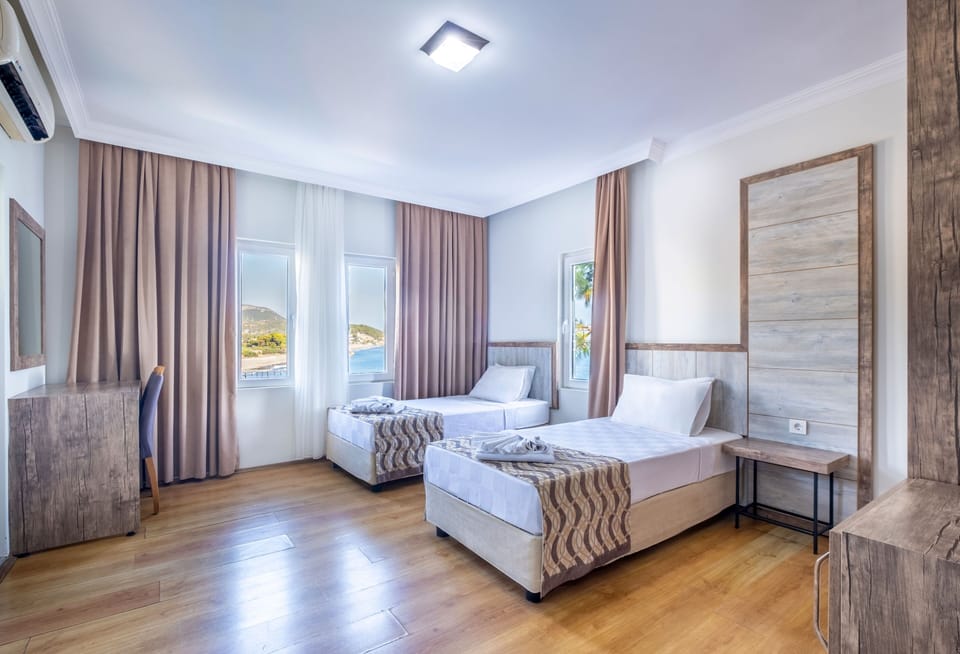 Family Room | Premium bedding, minibar, WiFi (surcharge), bed sheets