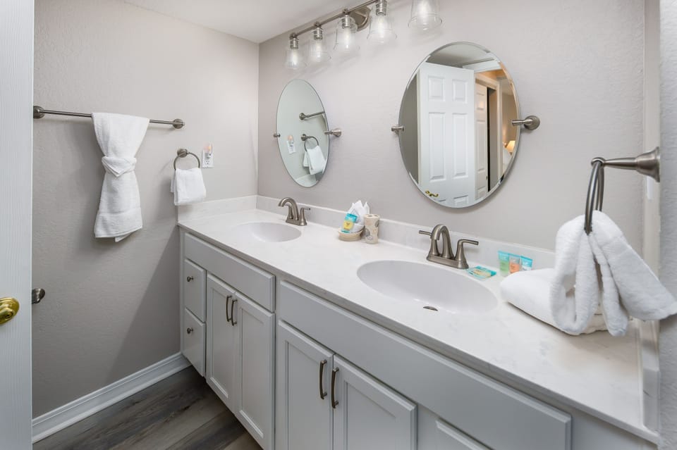 Master bathroom - Double vanity in this updated bathroom