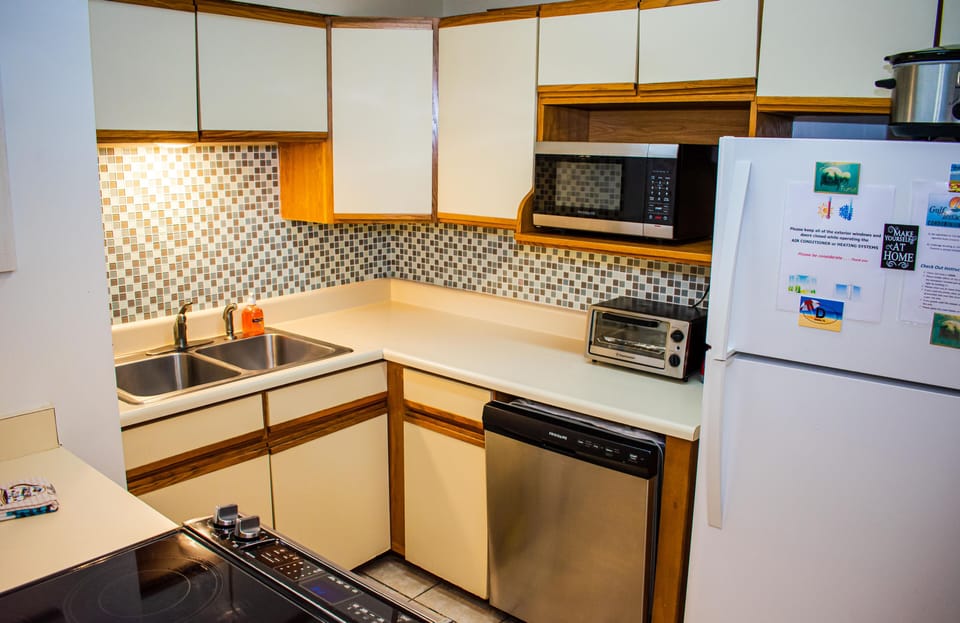 Fully stocked kitchen with additional utensils, tools and supplies