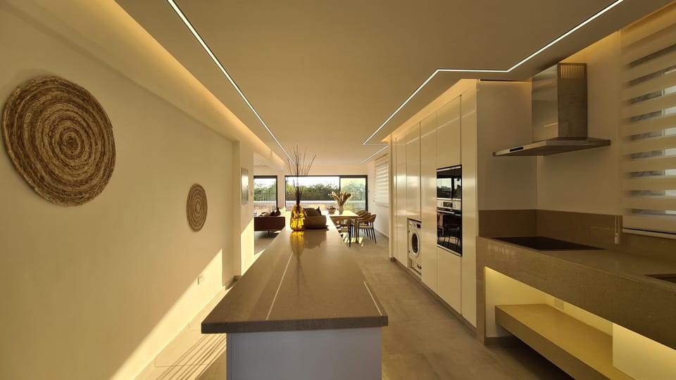 Deluxe Villa | Living area | 75-inch flat-screen TV with cable channels, Smart TV